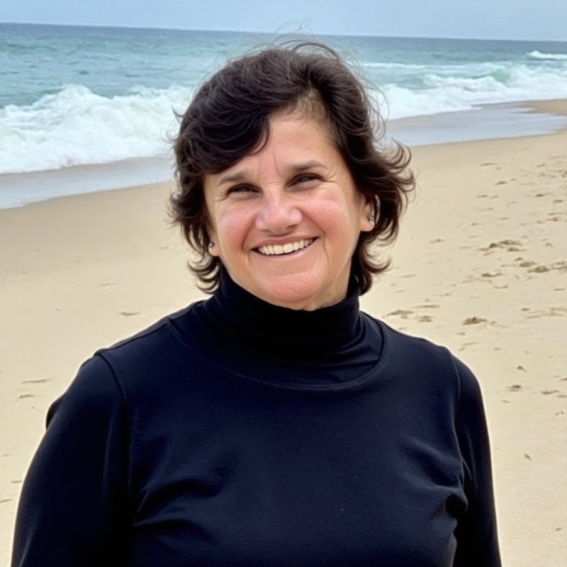 Jackie Nugara smiling on the beach